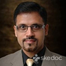 Dr. K. Dinesh Sharma-Dentist